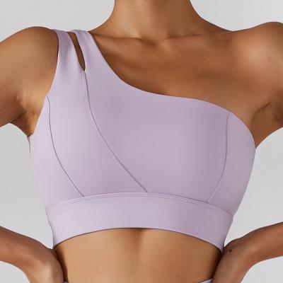 China Breathable Women's Style One-Shoulder Sexy Sports Bra Elastic Shockproof Running Tank Tops With Pads Yoga Bra for sale