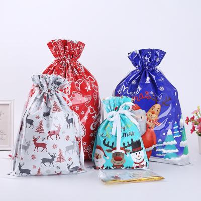 China Gift Packaging Customized Plastic Bags Print Present Merry Christmas Candy Gift Candy Party Christmas Bags for sale