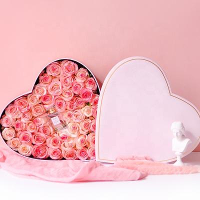 China Handmade Luxury Cardboard Heart Shape Rose Gift Packaging Embossing Paper Lid Flower Box With Custom Logo for sale