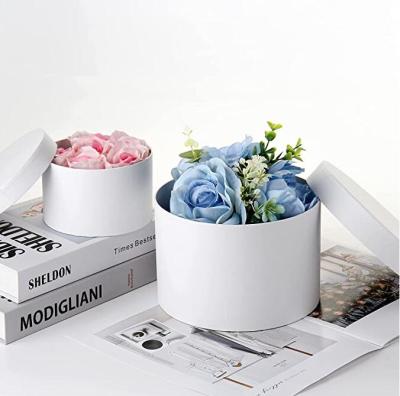 China Handmade Luxury Round Lid Cylinder Cardboard Flower Box Rose Gift Packaging Embossing Paper With Custom Logo for sale