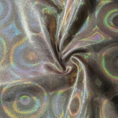 China Shiny Nylon Wax Stretch Fabric Spandex Tie Dye African Print Women Dance Dress Bikini Rainbow Fabric for sale