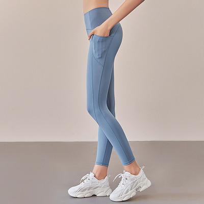 China Winter new viable kam bare sense double lines fishing hip waist sports fitness pants big belly in carry buttocks yoga pants for women for sale