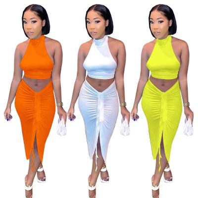 China 2021 hot sale QUICK DRY solid color halter crop top and drawstring skirt set two piece sets for women dress for sale