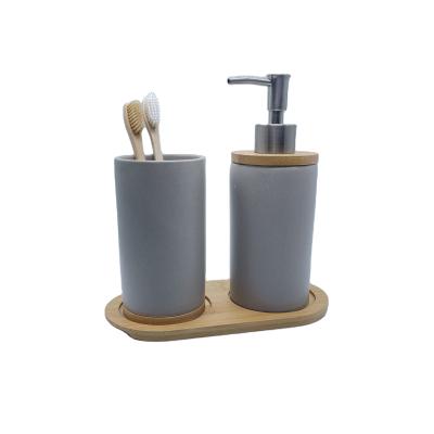 China Sustainable Two Piece Set Toothbrush Holder White Ceramic Mug With Bamboo Mat Travel Bottle Bathroom Sets for sale