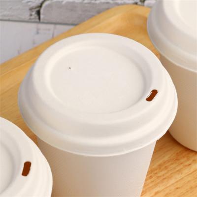 China Non Spill 80/90 Compostable Bagasse Coffee Cup Lid For Lid Sugarcane Pulp Cup for sale