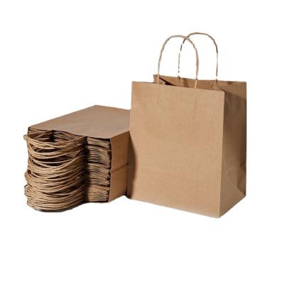 China Recyclable Customized Printed Paper Bags LOGO Fashion Shopping Paper Bag Brown Kraft Paper With Handle for sale