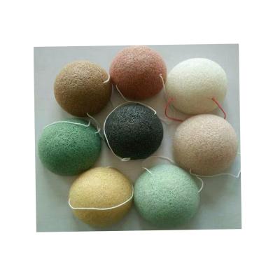 China Natural activated facial cleanser bamboo charcoal konjac facial sponge with individual packing for sale