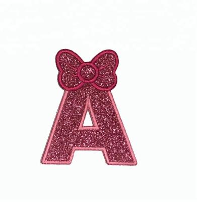 China Sustainable Custom Embroidery Iron On Sparkle Glitter Letter A With Bow Patch Iron On for sale