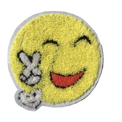 China Sustainable Custom Sew On Embroidered Chenille Patch Emojii Smile Patch for sale