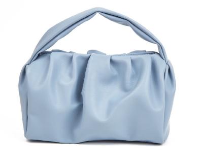 China High quality Japanese simple cloud bag texture 2022 solid color women's trend handbag soft makeup bag for sale