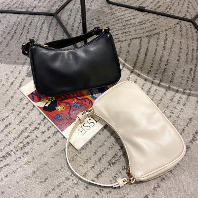 China Fashion small crowd female western style ladies shoulder bag 2022 portable casual women armpit bag for sale