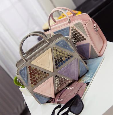 China 2021 new fashion zipper and latch rivet decoration rasta shoulder bag closure type PU leather handbag for sale