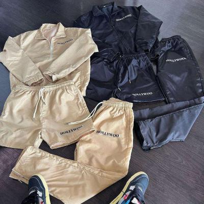 China Breathable Mens Custom Jacket Shorts 2 Piece Polyester Quick Dry Anorak Set Lightweight Short Tracksuit Set for sale