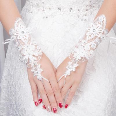 China Cheap Luxury Long Lace Bride Viscose/Polyester Price Gloves Bridal Wedding Gloves Lace Up Short Wedding Dress Finger Wedding Gloves for sale