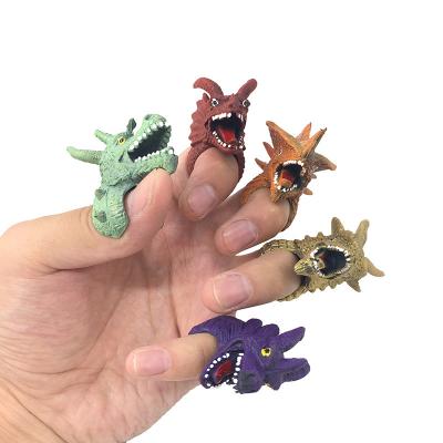 China Hot Selling Novelty XQ506 Dinosaur With Ring Dragons Action Silicone Finger Sleeve Doll Kids Educational Toy for sale