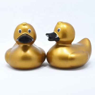 China Used For Entertainment Hot Sale Free Sample Gold Bath Plastic Promotional Floating Rubber Duck for sale