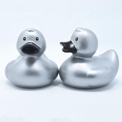 China Used For Entertainment Hot Selling Free Sample Plastic Promotional Bath Floating Silver Rubber Duck for sale