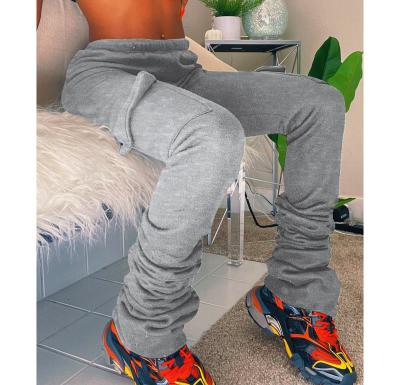 China Anti-Wrinkle Ready To Ship Winter Women Thick Jogger Pants Wholesale Slim Fit Pile Pants Streetwear With Side Pockets for sale