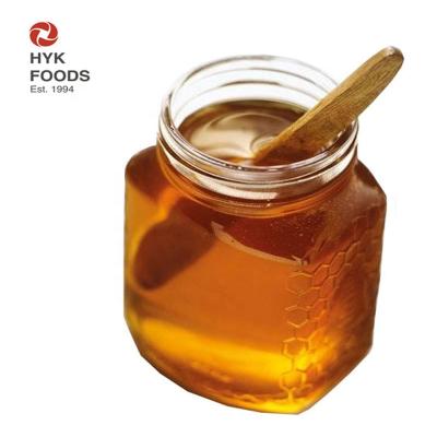 China 100% pure polyflora bee honey for healthy and beauty packed in glass bottle honey for sale