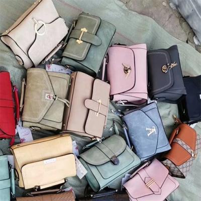 China Lady factory stocklots wholesale ready made storage used women handbags mixed PU bags running design wholesale for sale