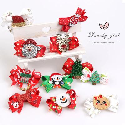 China Stretch Christmas New Design Korean Cute Glitter Bows Baby Hair Clip Children's Cloth Hair Bow For Girls for sale