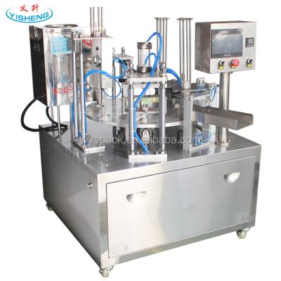 China Custom Beverage Grain Rotary Cup Filling Sealing Machine for sale