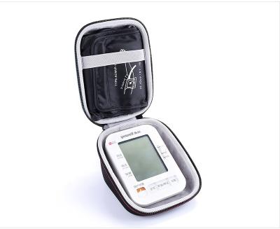 China Custom 900D+EVA+velvet Travel Carrying Waterproof Case Emergency Omron Eva Arm Blood Pressure Monitor Hard Case for sale