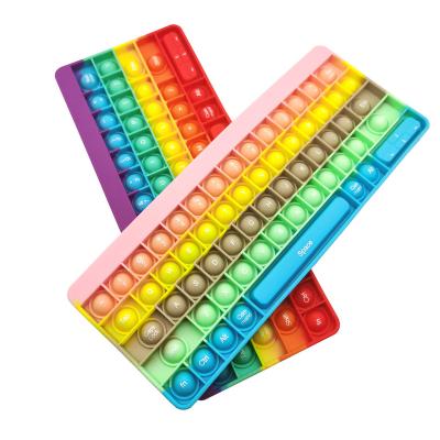 China New Eco-Friendly Rainbow Silicone Keyboard Push Bubble Autism Effort Desk Pack Poppings Her Fidgety Person Toys Set Keyboard for sale