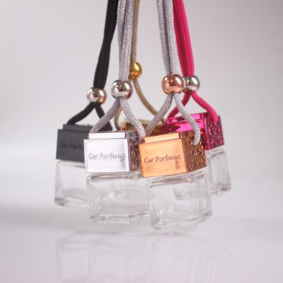 China Transparent Glass Car Perfume Bottle With Colorful Wooden Lid And String for sale