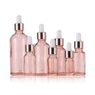 China Empty Essential Oil Bottles 10ml 20ml 30ml 50ml 100ml Rose Gold Glass Dropper Bottle for sale