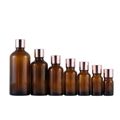 China Custom Glass Amber Essential Oil Bottles 10ml 15ml 20ml 30ml for sale