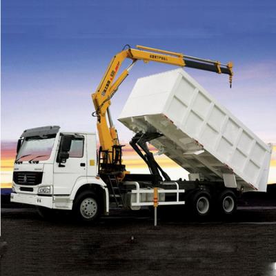 China SINOTRUK howo 6x4 dump truck with crane > 8L for sale