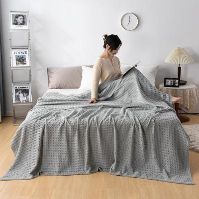 China 2022 Anti-Static New Design Solid Color Waffle Jacquard Pattern Weave Knitted 100% Cotton Blanket for sale