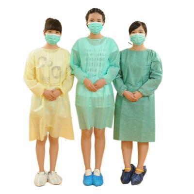 China Yellow Nonwoven Disposable Waterproof Long Sleeve Isolation Surgical Dental Gown With Elastic Cuff for sale