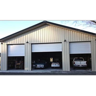 China Larger Span Prefab Metal Steel Fabricated Steel House Garage With Sandwich Door Roll Up In China for sale