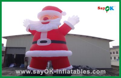 China Inflatable Party Decorations Custom Red Inflatable Christmas Santa Claus With Bread Inflatable Cartoon Character for sale