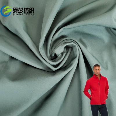 China 280gsm poliéster liso Shell Fabric Water Resistance macia à venda