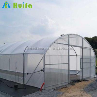 China Stable structure and modern appearance film poly greenhouse agricultural film greenhouse for sale film tunnel greenhouse for sale