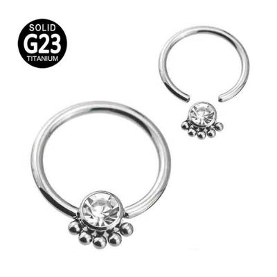 China FASHIONABLE Unique Titanium Beaded Design Ball Closure Ring With Bezel Set CZ Nose Septum Clicker Piercing Titanium Jewelry for sale