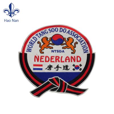 China 3D wholesales custom embroidery patches embroidered patch with border/merrow iron on backing apparel for sale