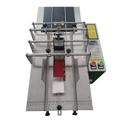 China DIKAI WFM220 food paging machine plastic adhesive labeling count date with automatic stacker paper paging machine for sale