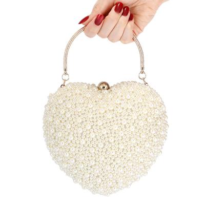 China Same Love White Clutch Bags Big/Bridal Heart Pearl Day Clutch Evening Bag Woman Girl Clutch Evening Bag Wedding Ivory Bag for sale