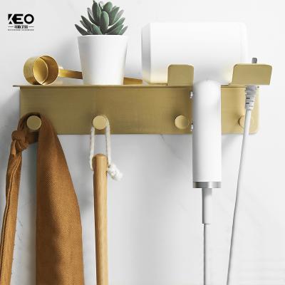 China Space Save KEO Nordic Light Luxury Bathroom Accessories Gold Hair Dryer Holder Bathroom Corner Shelves Brass Shelf for sale