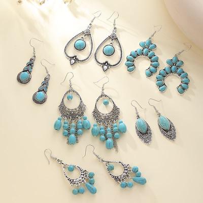 China New Arrival Bohemian Ethnic Cutout Dangle Earrings Calaite Vacation Jewelry Women Fashion Friendly Material Jewelry Retro Style Drop Earrings for sale