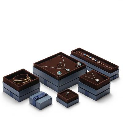 China Square jewelry box with grosgrain ribbon bow blue color jewelry box special paper bronze jewelry packaging boxe 65x65x45 mm and more for sale