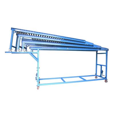 China Top Selling Guaranteed Quality Fire Resistant Heavy Duty Belt Roller Gravity Conveyor for Unloading Container Vehicles of All Sizes for sale