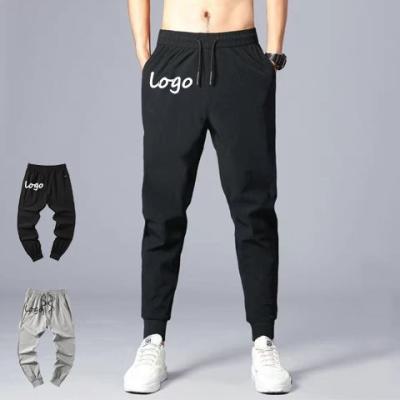 China Logo Sweatpants Gym Sports Pants Custom QUICK DRY for mens jogger pants mens gym joggers training fitness sweatpants jogger connecting pants for sale