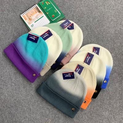 China New Arrival COMMON Winter Tie Dye Shielding Wool Hat Gradient Casual Warm Color Knitted Hat For Women Men for sale