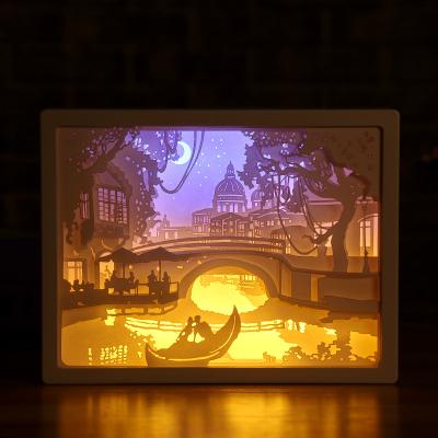 China Modern Customize Creative Desk Lamp Couples Photo Frame Romantic Bedside Book Lamp Paper Cutting Soft Light Table Lamp for sale