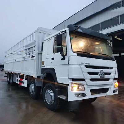 China cheap price used barrier cargo truck 8x4 sinotruk howo stakes trucks 6 - 8L for sale